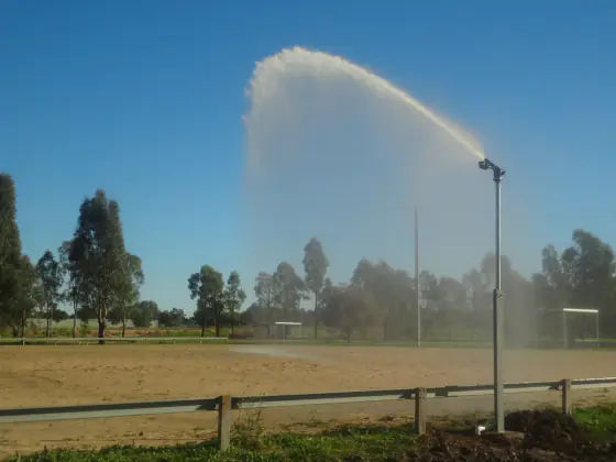 Large irrigation gun watering an arena